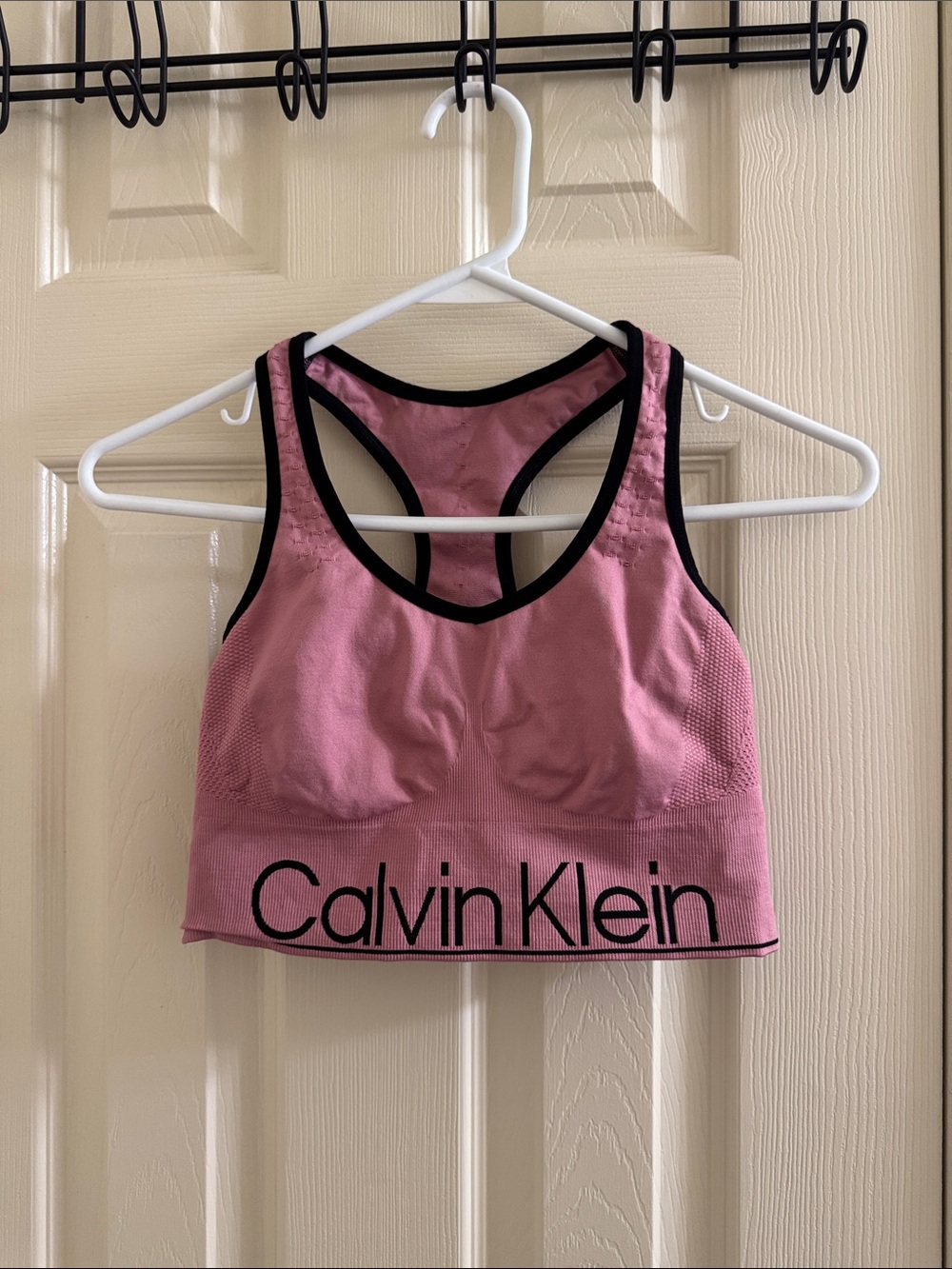 Pink Calvin Klein sports bra